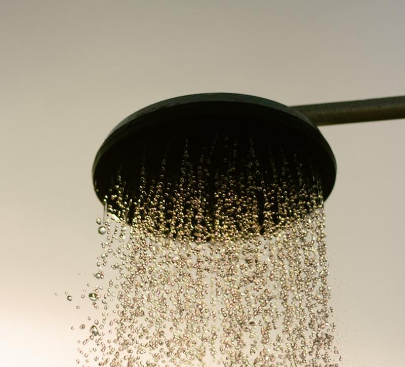 a shower head with a lot of water coming out of it