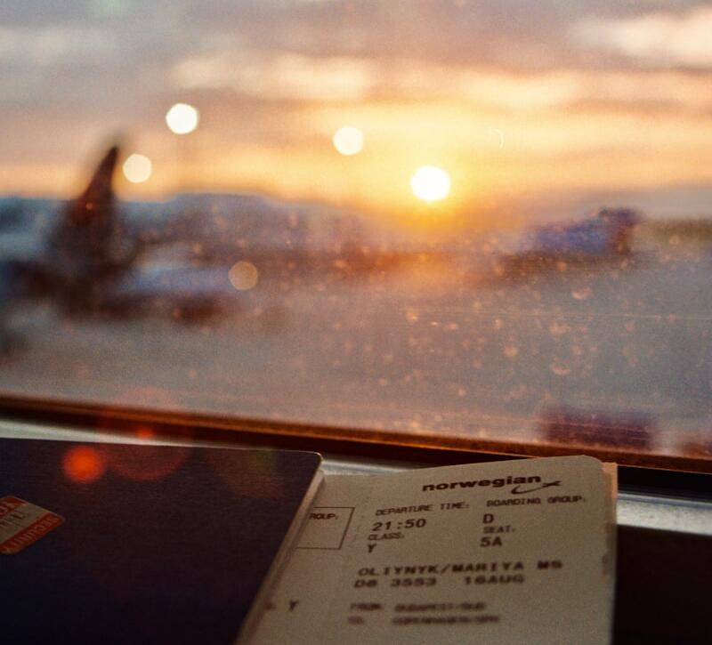 white printer paper on glass window during sunset