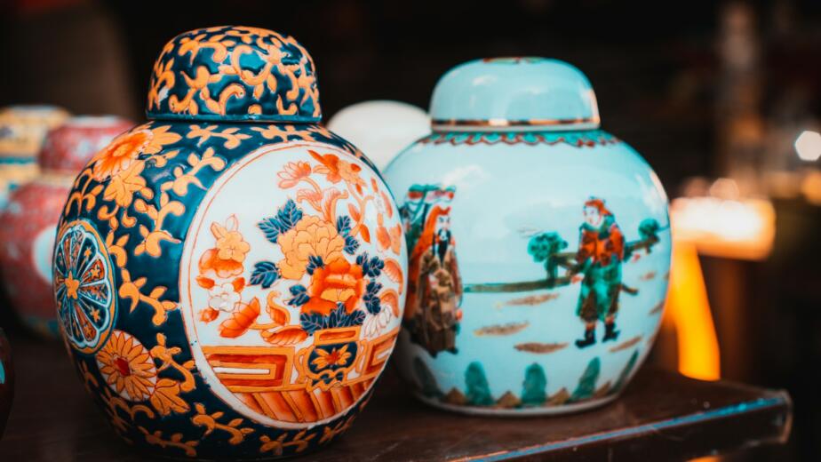 a couple of vases that are sitting on a table