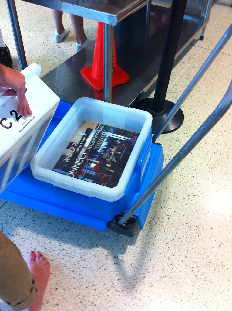 Travel Experts Say You Should Never Place Your Phone in an Airport Security Bin